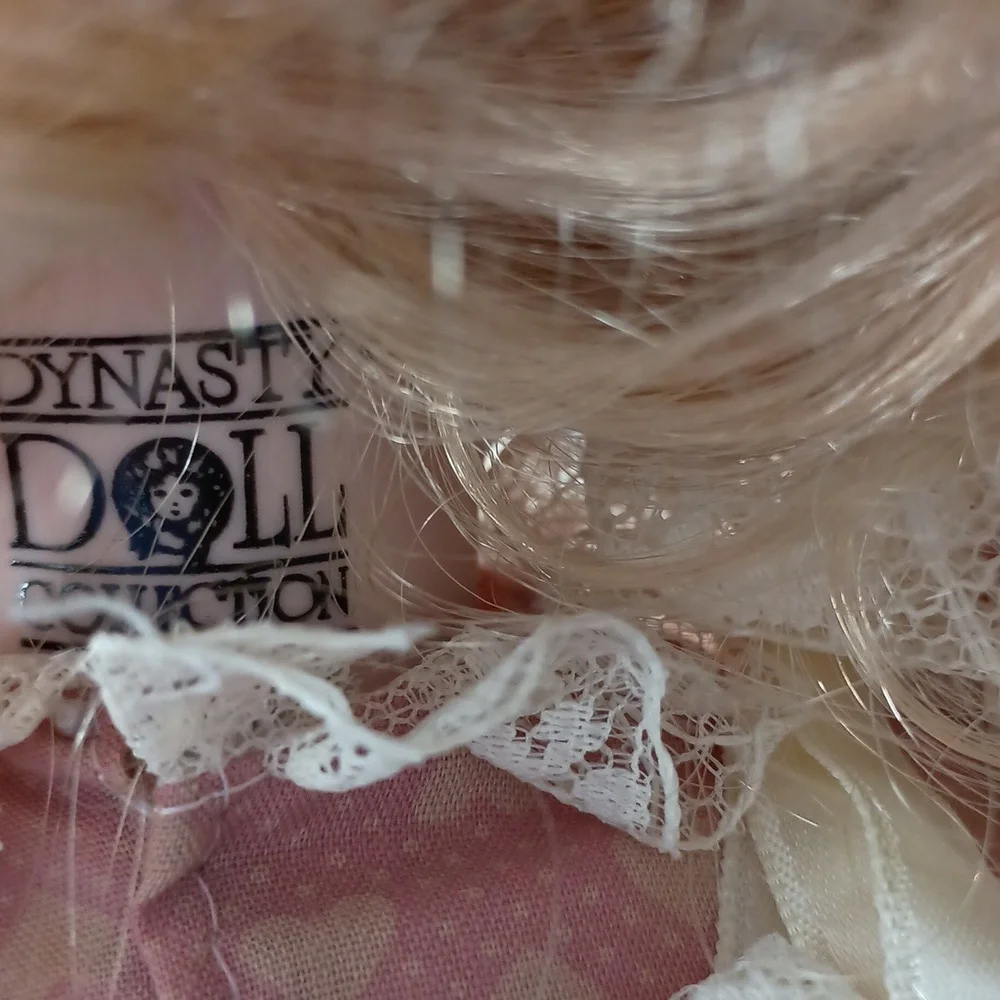 Vintage Porcelain Doll with Pink Dress and Bonnet by Dynasty Dolls